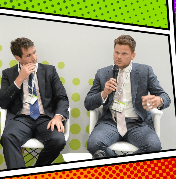 People talking on stage IMHX expo